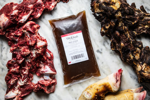 Pouring TRUEfoods Wholesale Beef Stock 2.5kg